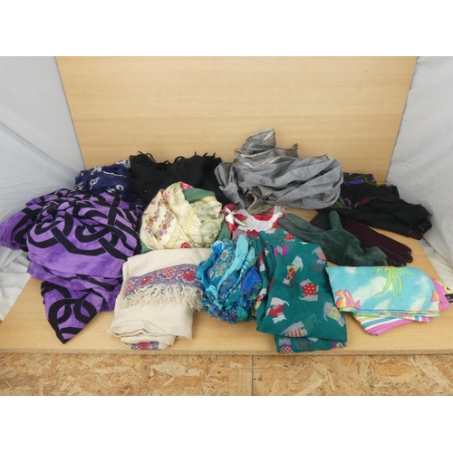 1034 - An assortment of various silk scarves etc.