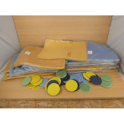 1035 - A large assortment of vintage ex shop stock rubber mats.