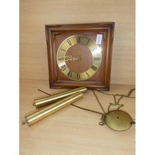 1036 - A vintage wall clock.