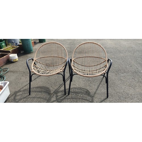 61 - A pair of retro style garden chairs.