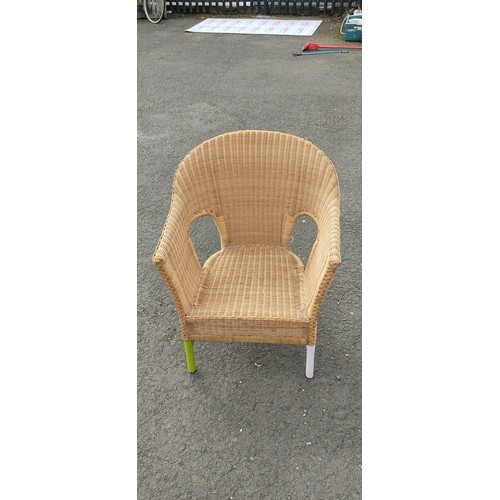 762 - A wicker chair.