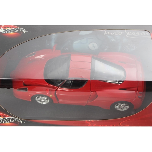 1 - A boxed Hot Wheels Ferrari model car.