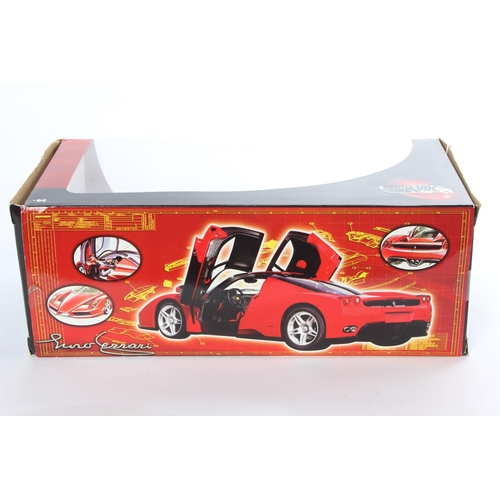 1 - A boxed Hot Wheels Ferrari model car.