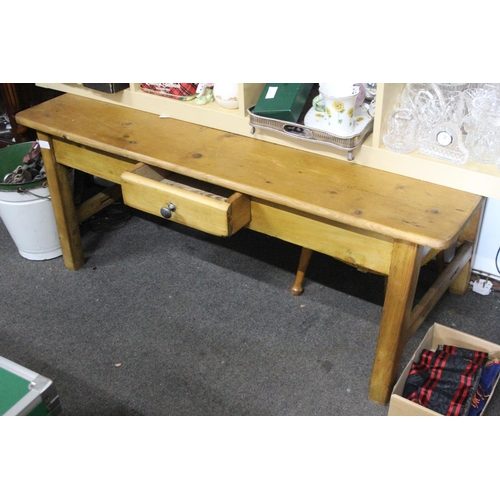 18 - A pine coffee table with drawer.