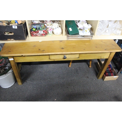 18 - A pine coffee table with drawer.