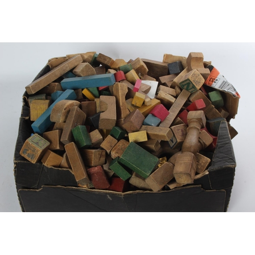 29 - A large assortment of vintage wooden building blocks.