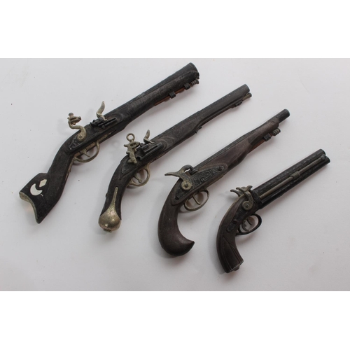 30 - A collection of 4 miniature flintlock guns by MAM Uniwerk, Italy.