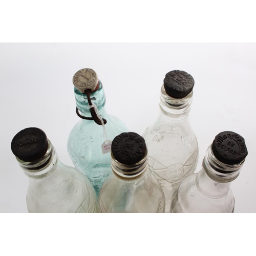 34 - 5 antique glass bottles with stoppers.