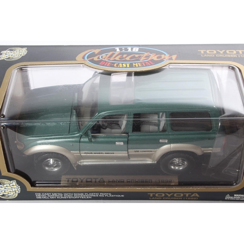 4 - A boxed Toyota Land Cruiser (1992) model car, by Road Tough.