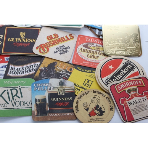 46 - A job lot of assorted vintage beer mats.