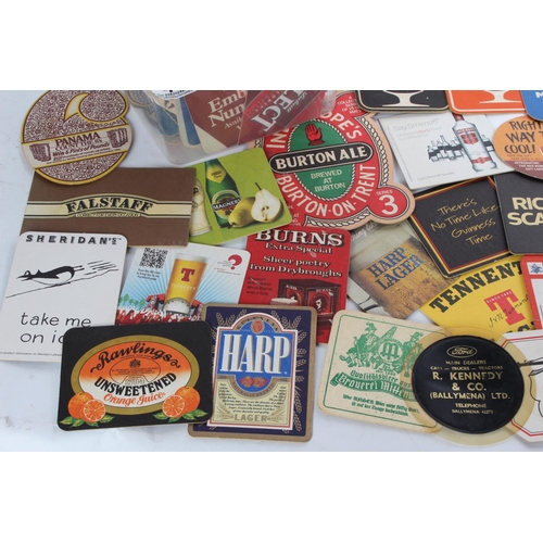 46 - A job lot of assorted vintage beer mats.