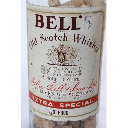 53 - Two large 4.5L vintage Bell's Scotch Whisky bottles.