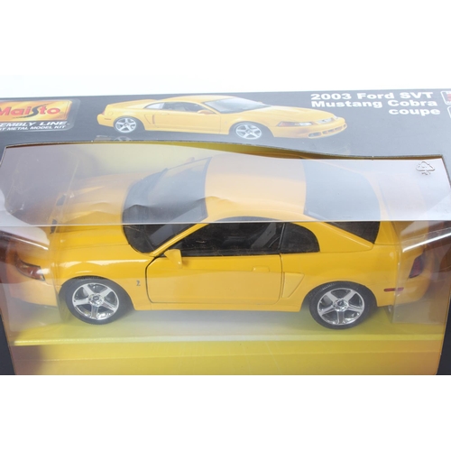 8 - A boxed 2003 Ford SVT Mustang Cobra Coupe model car, by Maisto.