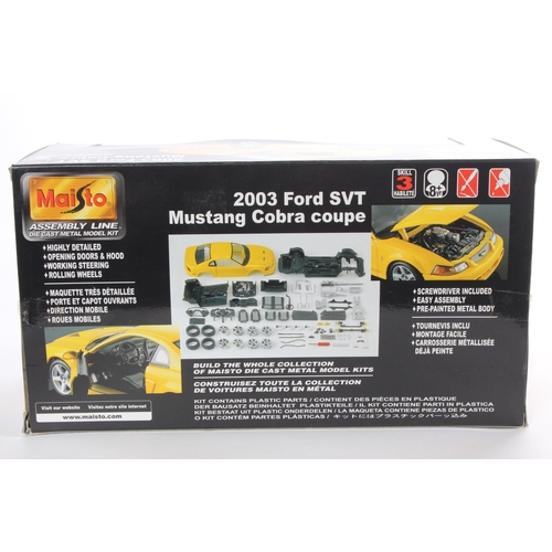 8 - A boxed 2003 Ford SVT Mustang Cobra Coupe model car, by Maisto.