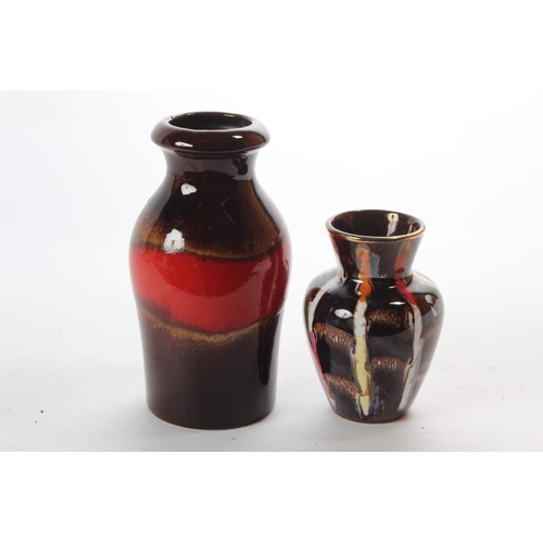 124 - Two stunning West German pottery vases.
