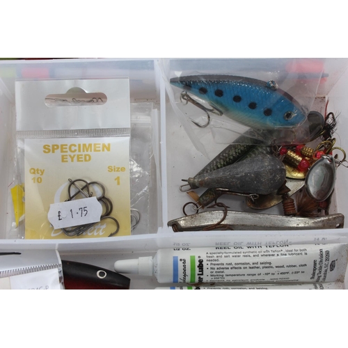 129 - A fishing storage case and lures etc.