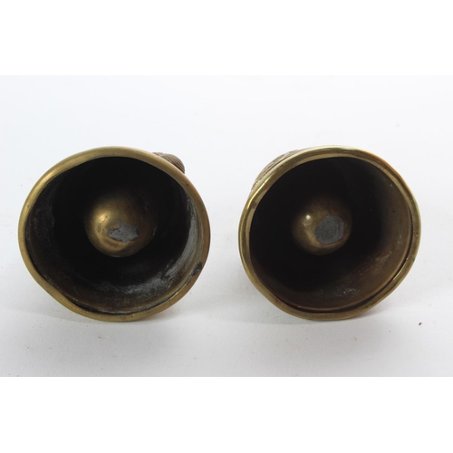 132 - A pair of vintage military crested brass holders.