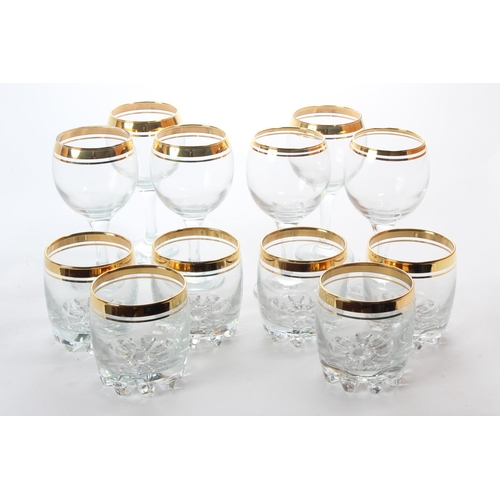 133 - Two sets of six gilted glass sets.