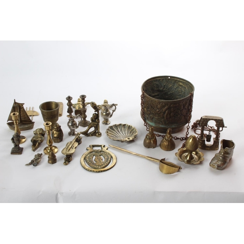 153 - A collection of vintage brassware.