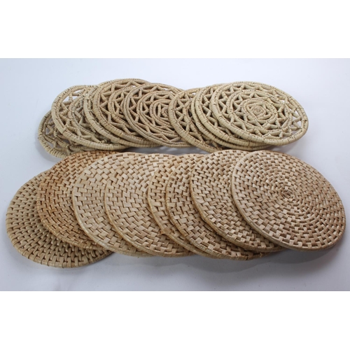 156 - A collection of rattan placemats.