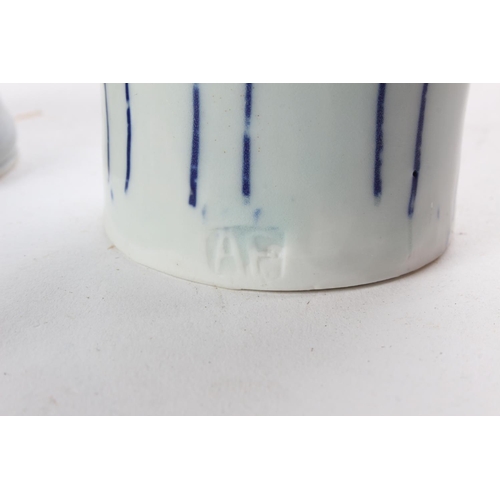 167 - An Adam Frew pottery vase and another.