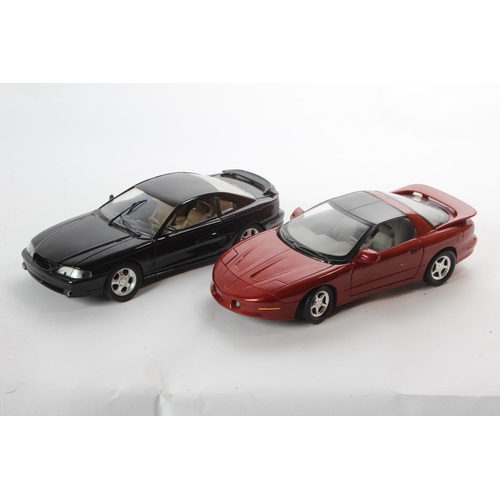 174 - 2 model cars to include an ERTL Pontiac Firebird & a Jouef Evolution Ford Mustang.