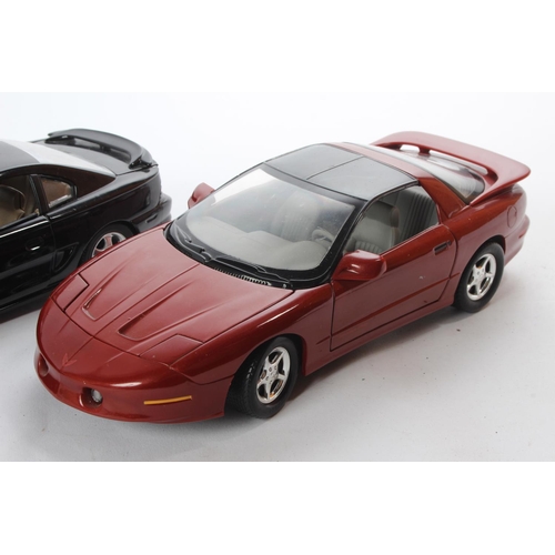 174 - 2 model cars to include an ERTL Pontiac Firebird & a Jouef Evolution Ford Mustang.