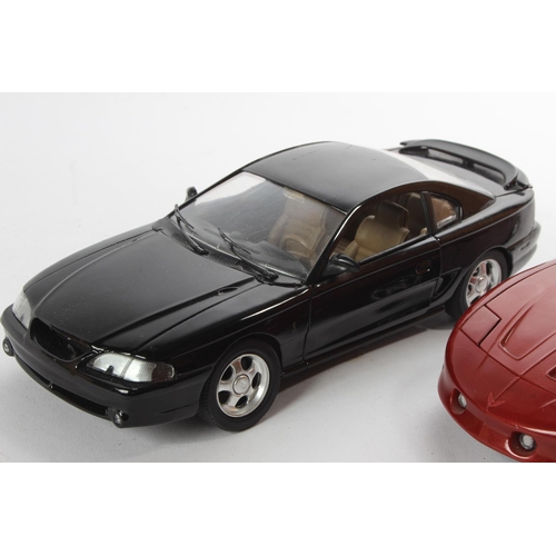 174 - 2 model cars to include an ERTL Pontiac Firebird & a Jouef Evolution Ford Mustang.