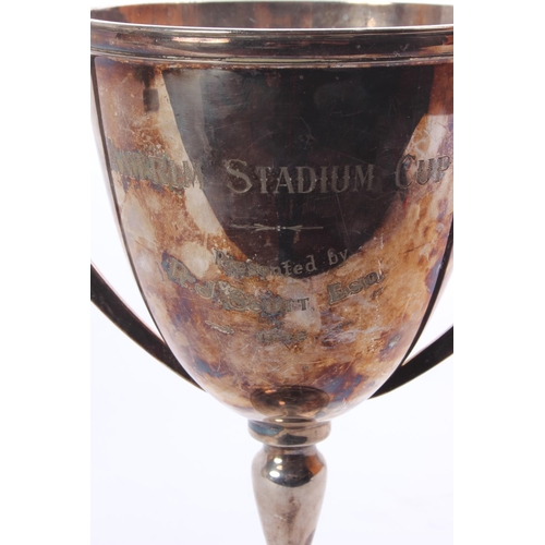 177 - A large silver plated cup/ award, 'Antrim Stadium Cup - Presented by RJ Scott Esq - 1972'.