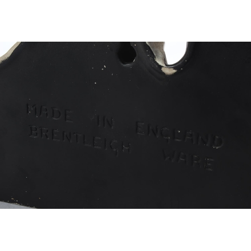 197 - A stunning antique ceramic pub advertising figure for Black & White Scotch Whiskey, produced by Bren... 