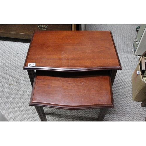 224 - A mahogany nest of two tables.