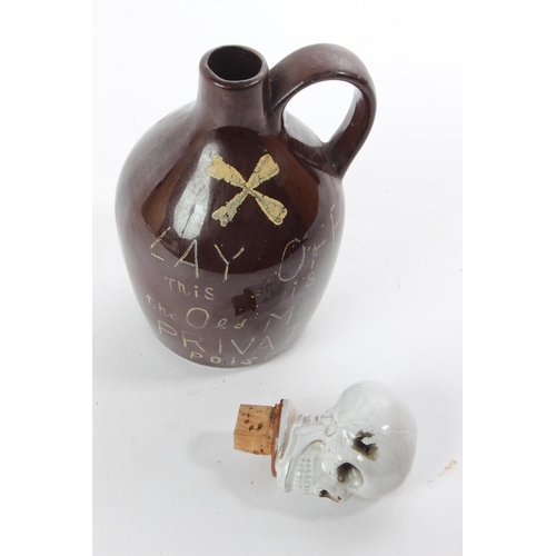 An unusual Japanese ceramic decanter 'Lay Off this - Is the Old