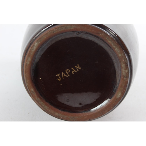 An unusual Japanese ceramic decanter 'Lay Off this - Is the Old