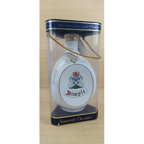 159 - A boxed 75cl 43% Dimple whiskey celebrating the 1986 Commonwealth Games.