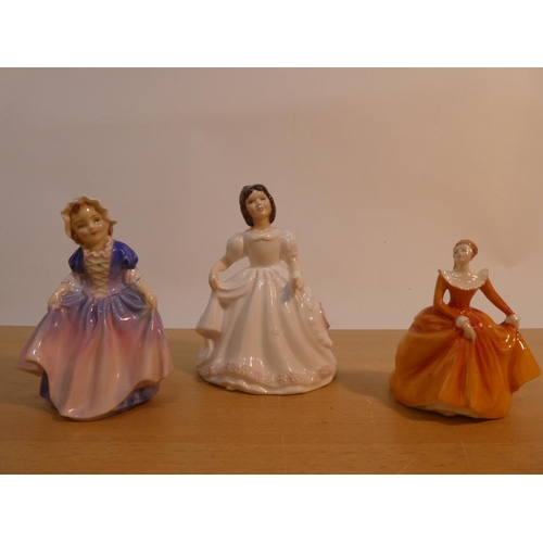 102 - Three Royal Doulton figures 'Fragrance HN3220, Dinky Do HN1678, and Amanda HN3635'.