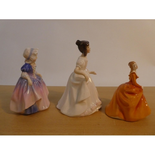 102 - Three Royal Doulton figures 'Fragrance HN3220, Dinky Do HN1678, and Amanda HN3635'.