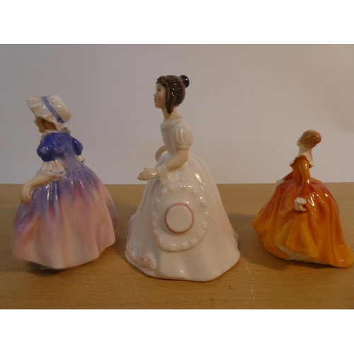 102 - Three Royal Doulton figures 'Fragrance HN3220, Dinky Do HN1678, and Amanda HN3635'.