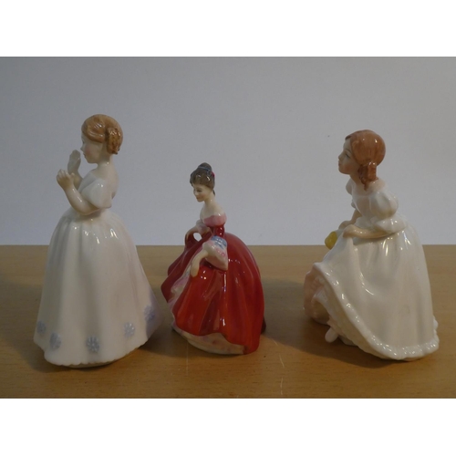 108 - Three Royal Doulton figures 'Southern Belle HN3174, Catherine HN3044 and Lynsey HN3043'.