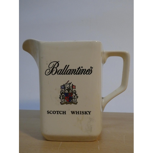 112 - A vintage Wade Ballantines Scotch Whisky pub jug.