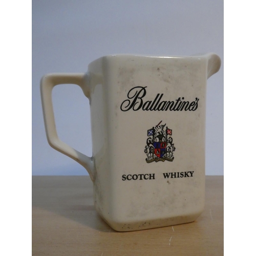 112 - A vintage Wade Ballantines Scotch Whisky pub jug.