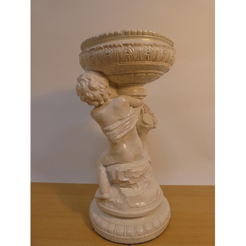 123 - A concrete cherub design pedestal, 40cm tall.