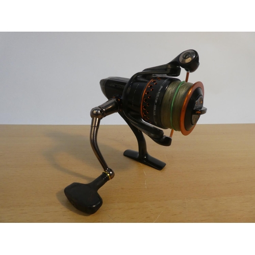 125 - An Alpax 400d FD fishing reel.