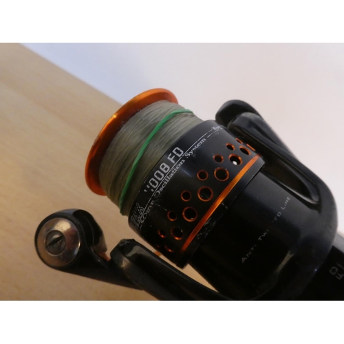 125 - An Alpax 400d FD fishing reel.