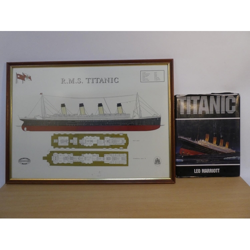 67 - A framed print of R.M.S. Titanic and book.