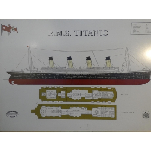 67 - A framed print of R.M.S. Titanic and book.