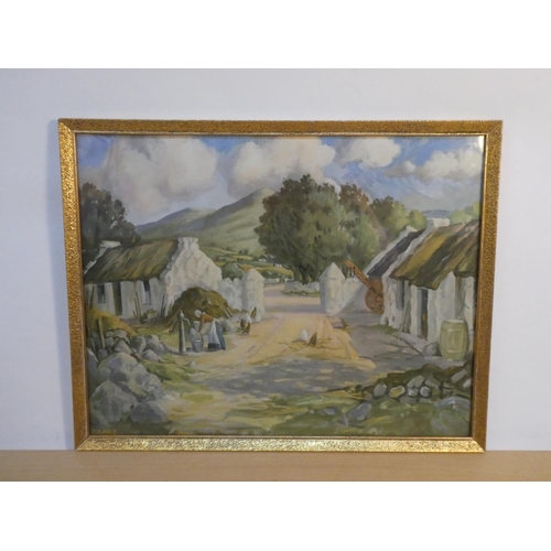 69 - A vintage framed print of an Irish scene signed G Gault.