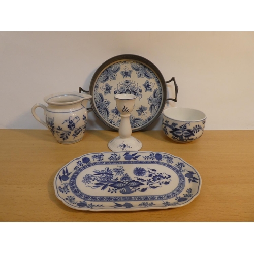 82 - A collection of antique and vintage blue and white ware.