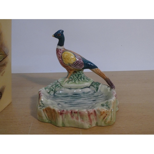 88 - An Aynsley lidded jar and a Beswick Pheasant ashtray.