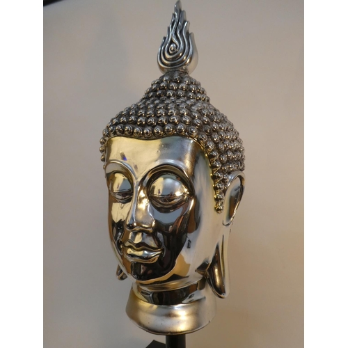 92 - A large decorative Buddha bust on stand, measuring approximately 39