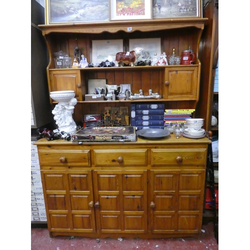 99 - A pine kitchen dresser.